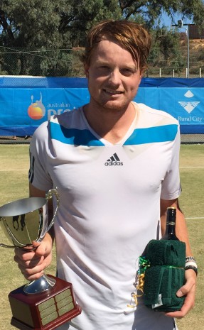 Matthew Barton poses with his trophy after defeating Harry Bourchier in the men's singles final of the Mildura Grand International