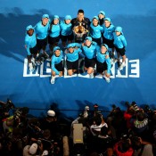 Novak Djokovic poses with ballkids after his victory at Australian Open 2013. GETTY IMAGES