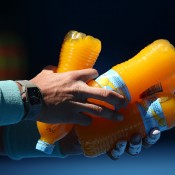 MELBOURNE, AUSTRALIA - JANUARY 22:   Rafael Nadal of Spain holds drink bottles in his quarterfinal match against Grigor Dimitrov of Bulgaria during day 10 of the 2014 Australian Open at Melbourne Park on January 22, 2014 in Melbourne, Australia.  (Photo by Clive Brunskill/Getty Images)