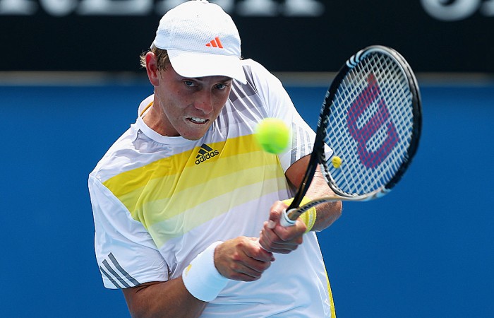James Duckworth - 2013 Australian Open - Day 4 James Duckworth of Australia plays a backhand in his second round match against Blaz Kavcic of Slovenia during day four of the 2013 Australian Open at Melbourne Park on January 17, 2013 in Melbourne, Australia; Getty Images