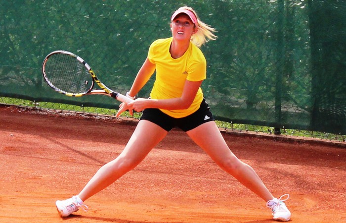 Storm Sanders slides into a shot on the red clay of Tennis Club Chiasso during an Australian Fed Cup team practice session; Tennis Australia Storm Sanders slides into a shot on the red clay of Tennis Club Chiasso during an Australian Fed Cup team practice session; Tennis Australia