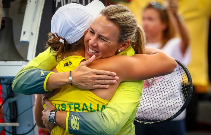 LEADER: Alicia Molik embraces Australian No.1 Ash Barty during the Fed Cup semifinal in Brisbane in April; Getty Images