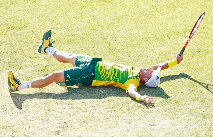Lleyton Hewitt celebrates his victory over Aleksandr Nedovyesov in the decisive fifth rubber of the Australia v Kazakhstan Davis Cup World Group quarterfinal in Darwin; Getty Images
